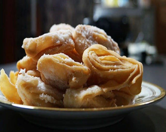 Chirote / Khaja is a popular sweet from Maharashtra in India.Chirote is Maharashtrian delicacy