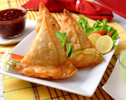 Samosa is Indian street food made with potatoes and spices